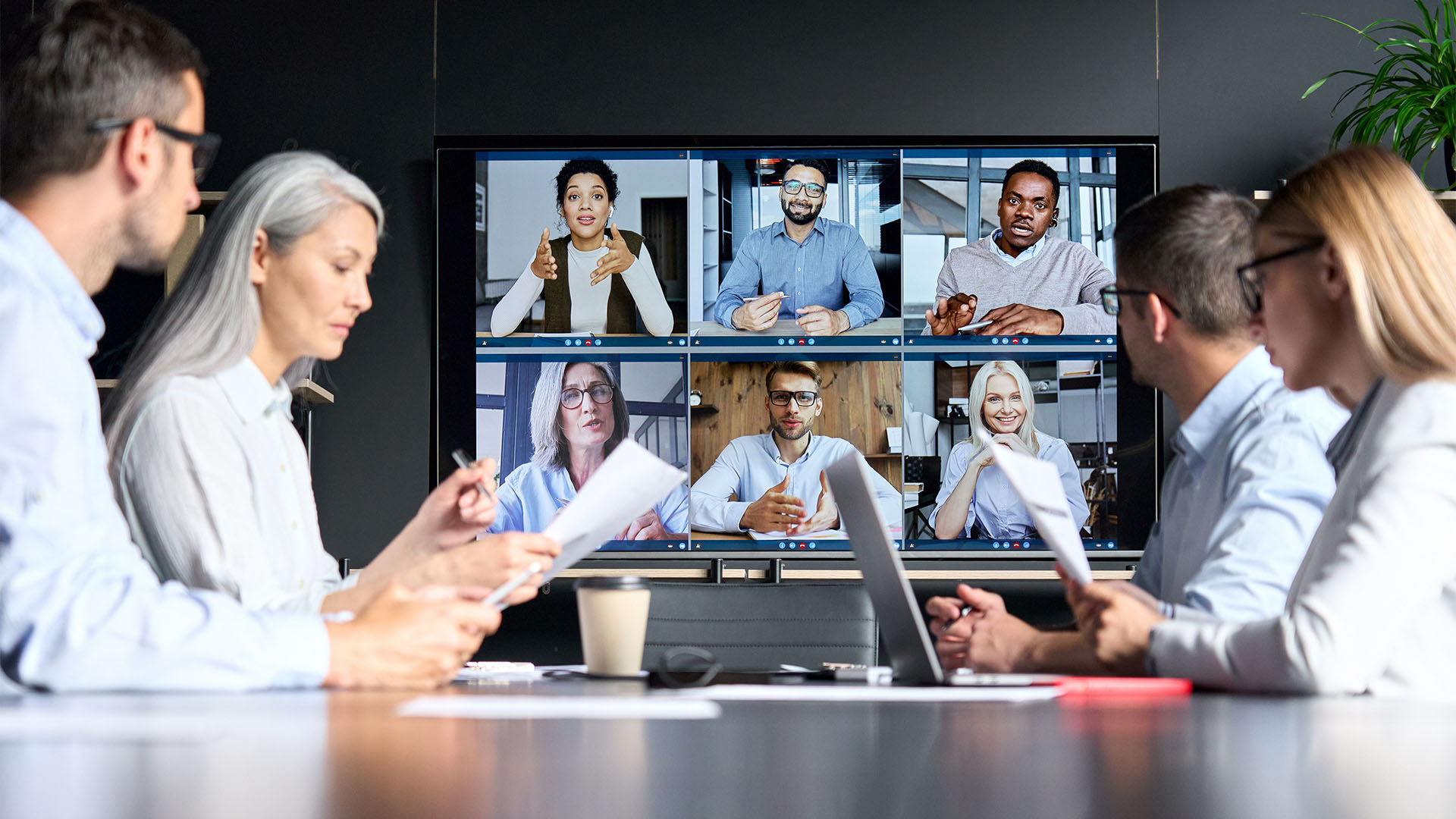 Sustainability – Active Collaboration Group of individuals on a conference video call