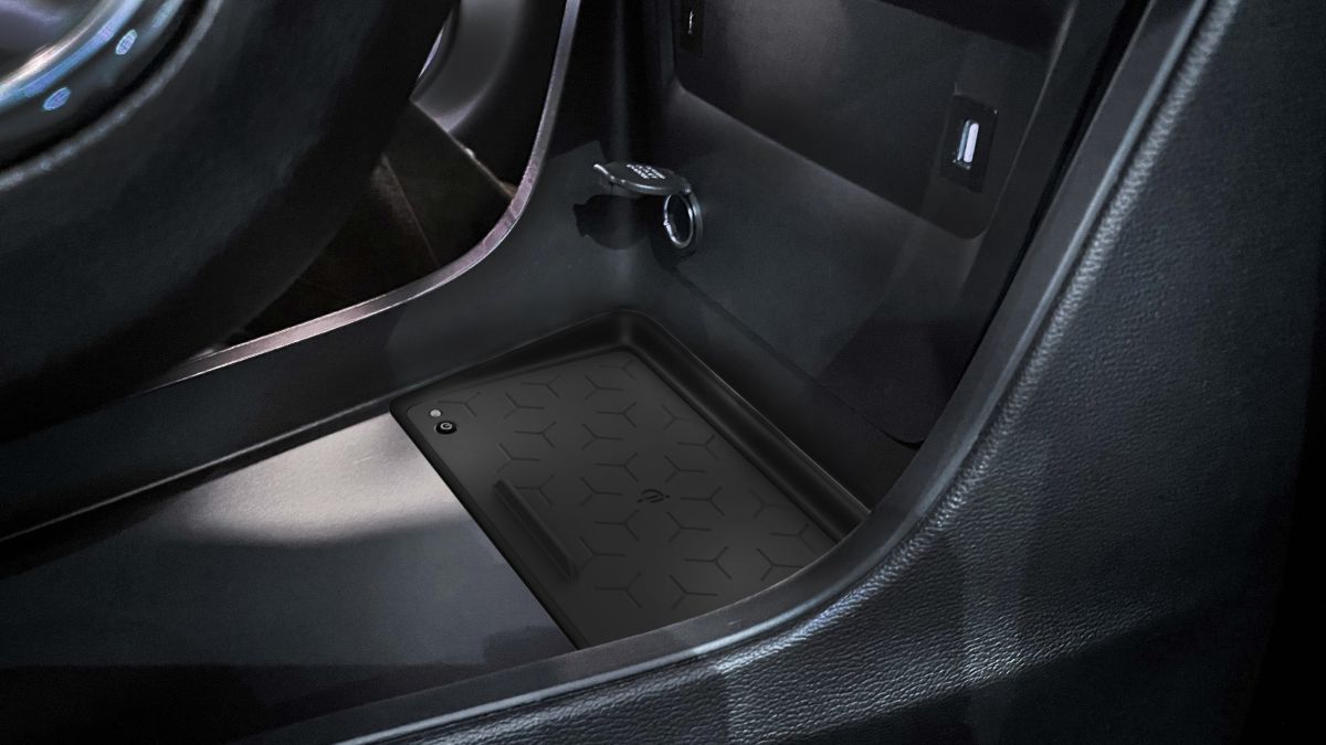 Wireless Device Charger Wireless phone charger integrated into the central console of a passenger vehicle